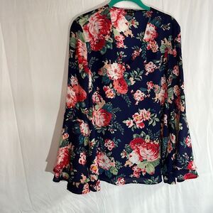 Iman medium blouse is layered flared sleeves